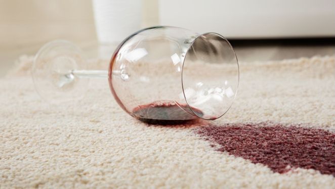 A carpet with a wine stain 